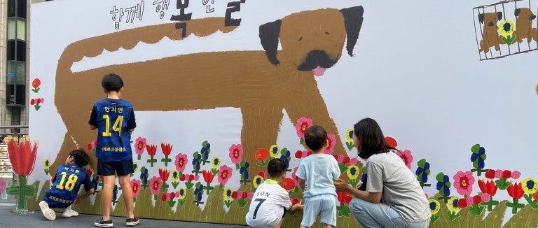 People attend an event to end the dog meat trade