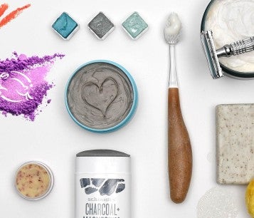 Array of cruelty-free personal care items, like makeup, shampoo, toothpaste, sun block and shaving cream.