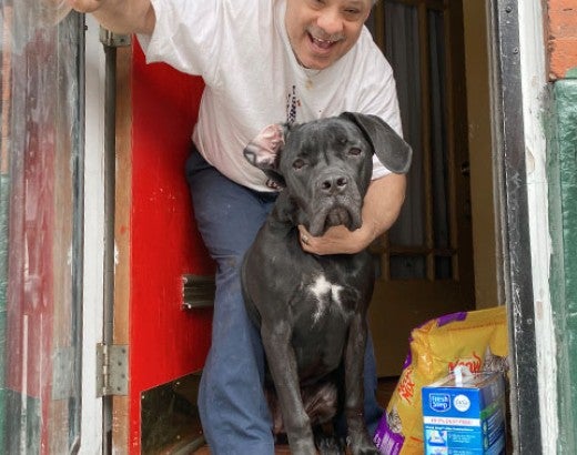 Man gets pet food from Pets for Life, run by the HSUS