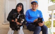 Pets for Life team meets with a recipient during a ride along clinic