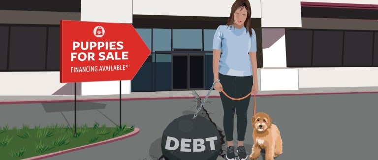 Illustration showing a woman walking out of a pet store with a puppy on a leash in one hand and a giant iron ball with the word Debt in the other.