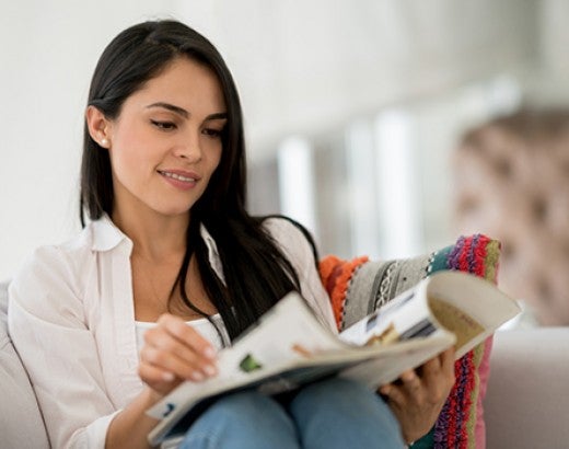 Woman reading a magazine